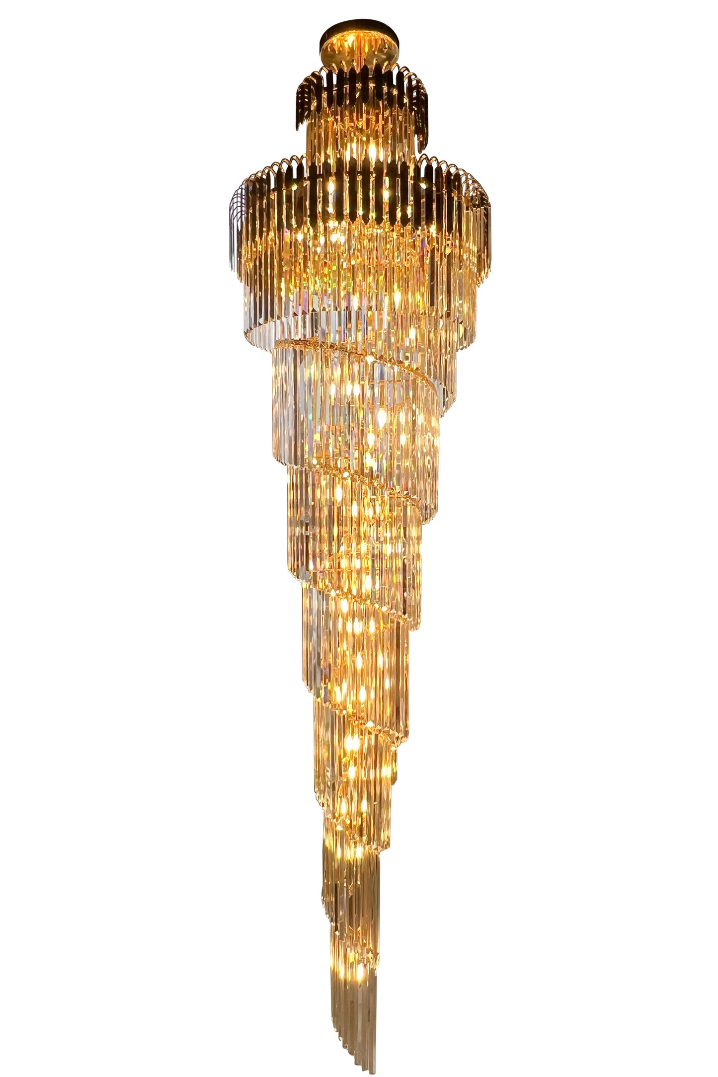 Handcrafted crystal prisms reflecting light in gold chandelier