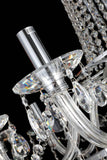 Detailed view of curved crystal arms and polished chrome frame for radiant reflection.