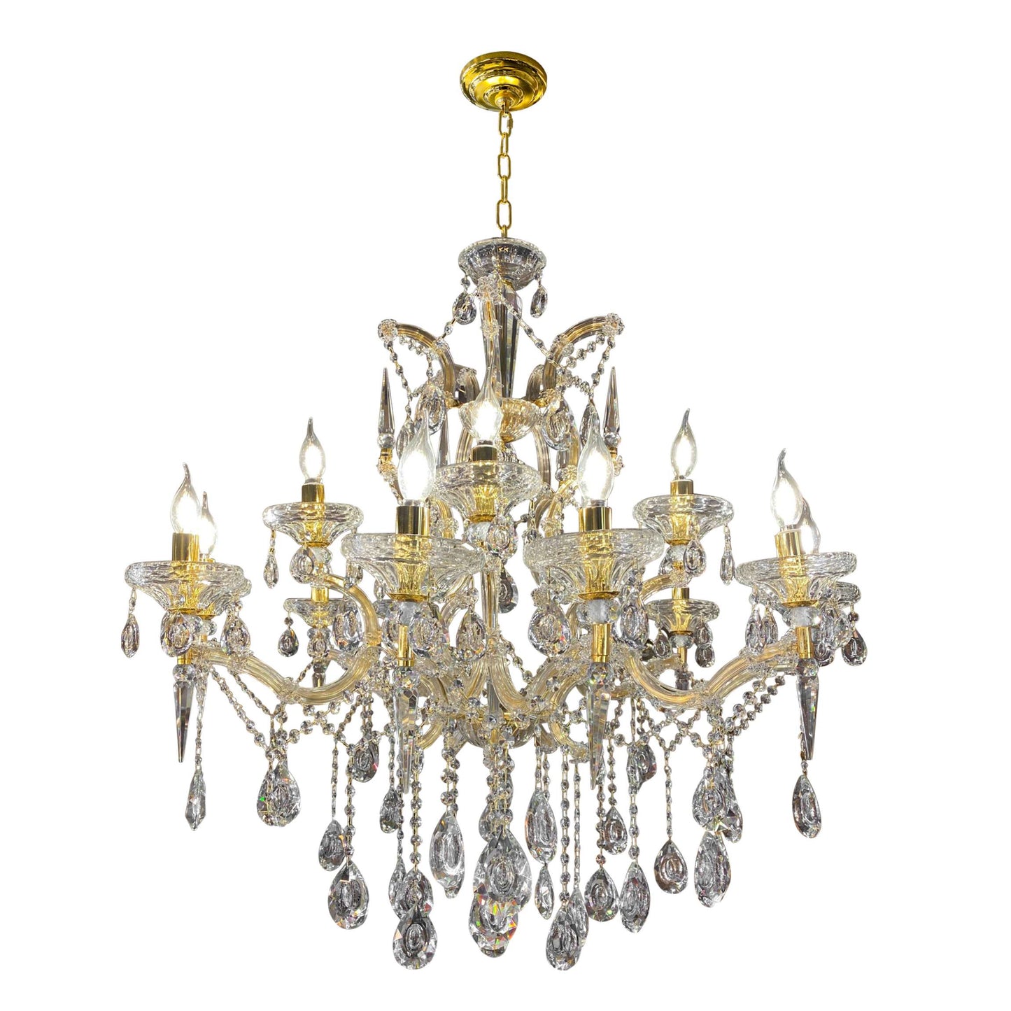 Close-up of 30% full-lead teardrop crystals on gold Maria Theresa chandelier.