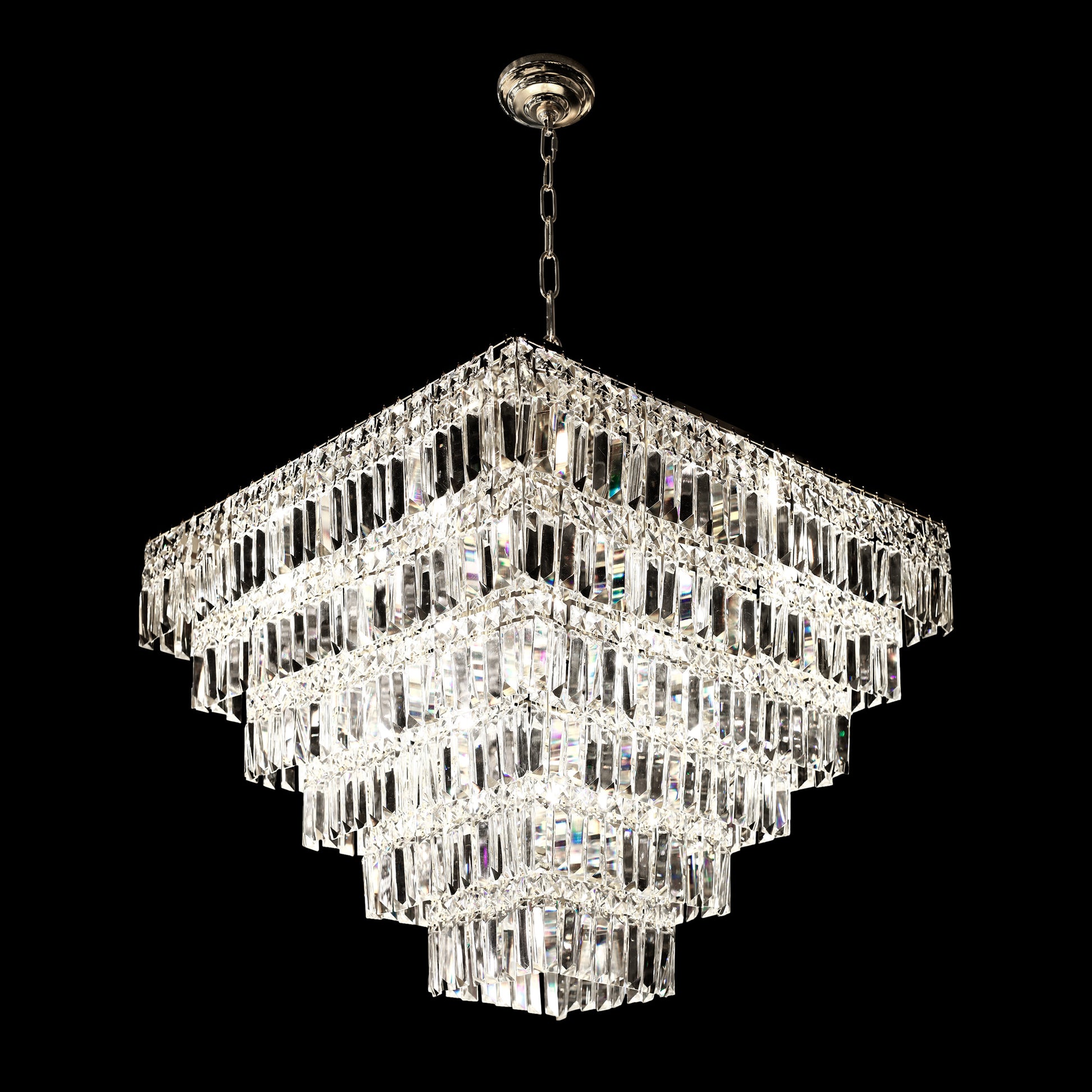 A luxurious 6-tier chrome crystal chandelier with a polished chrome finish and sparkling clear crystals, suitable for elegant lighting in living rooms or formal areas.