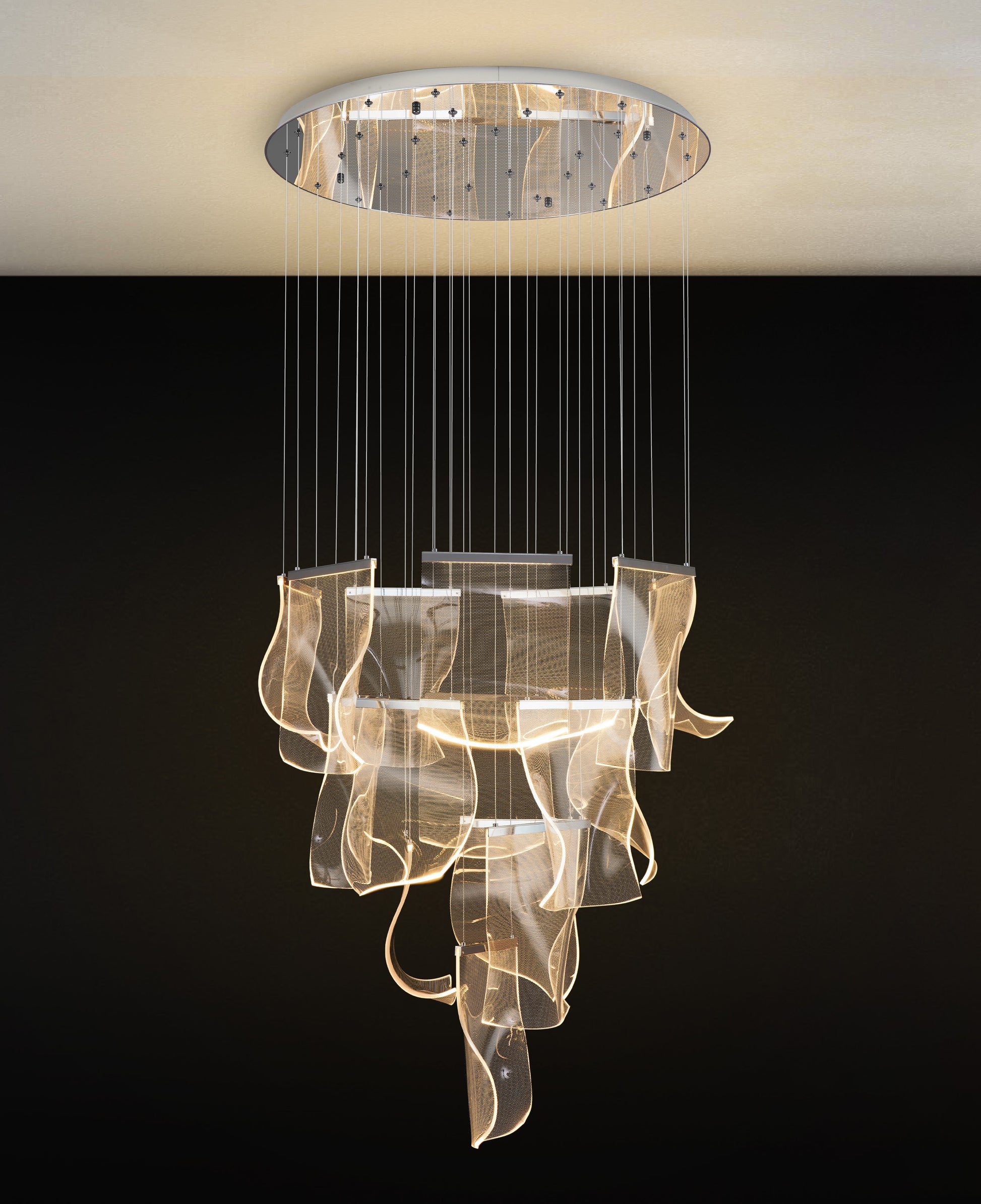 Close-up view of chrome LED wave panel chandelier showing cascading acrylic panels and modern reflective finish