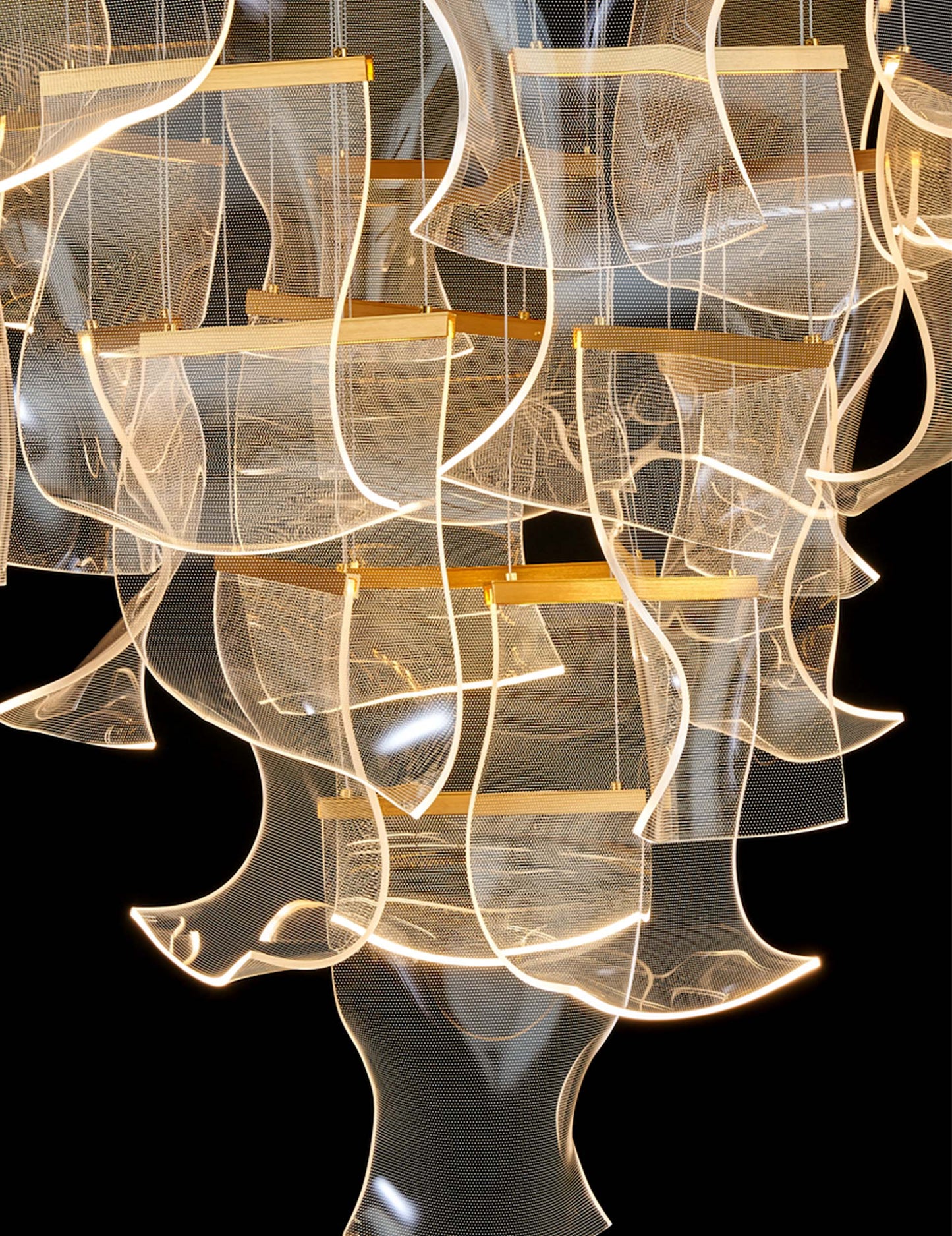  Close-up of layered gold-accented acrylic panels from the dimmable and adjustable LED chandelier with elegant sculptural form