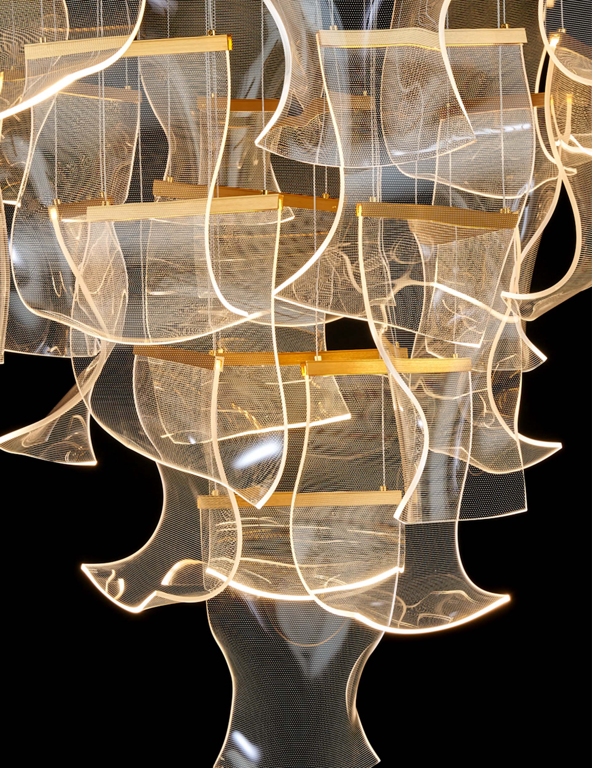 Close-up of layered gold-accented acrylic panels from the dimmable and adjustable LED chandelier with elegant sculptural form