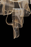 Layered wave LED chandelier with adjustable suspension cables and dimmable light, ideal for modern luxury interiors.