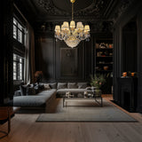  Dimmable gold crystal chandelier adding warm ambiance to a modern dark living room