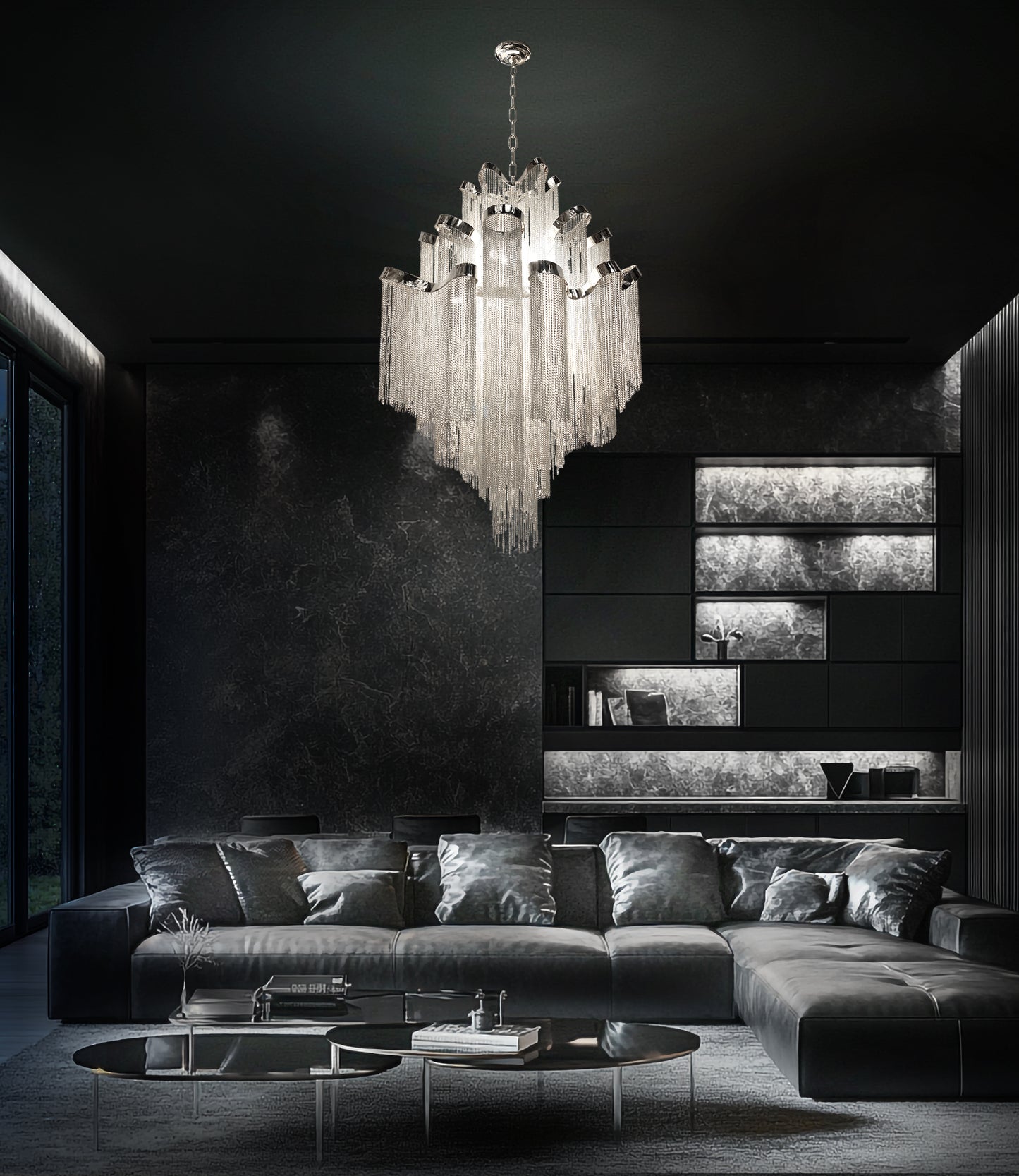 Elegant 29inch chrome chain chandelier illuminating a contemporary living room with dark walls and modern furniture.
