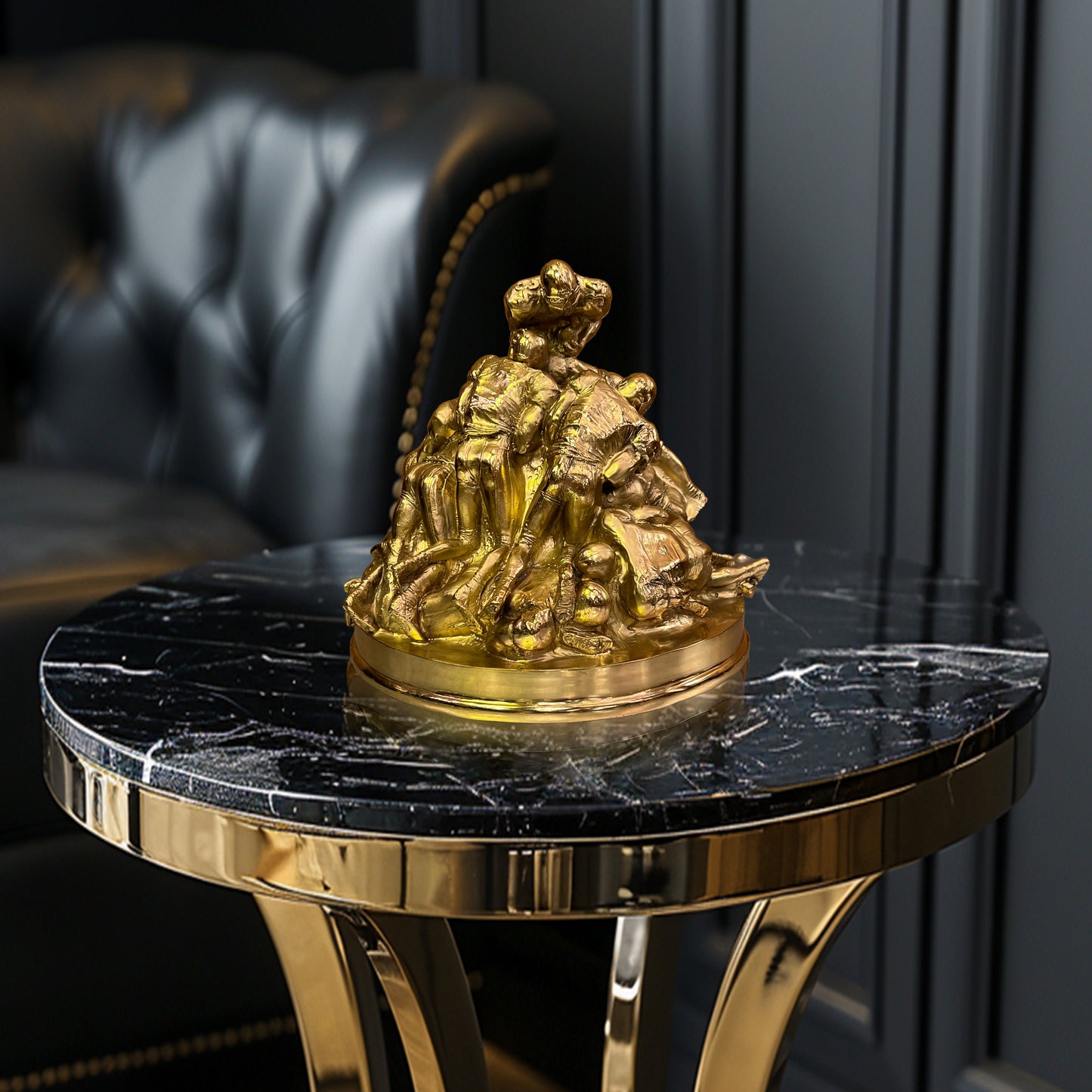 Side view of the handcrafted brass football sculpture highlighting the dynamic movement of the players.