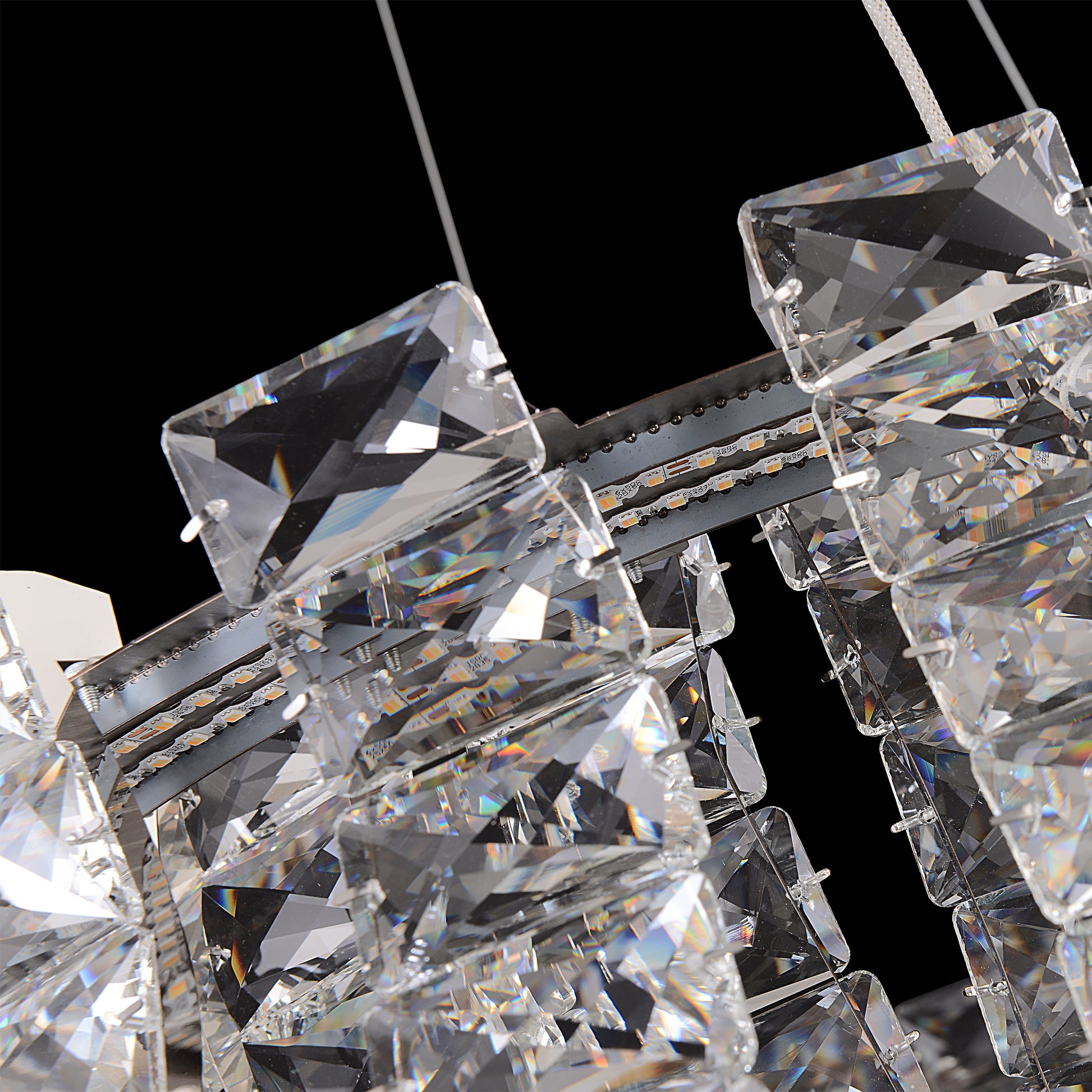 Bottom view of the circular chrome  crystal chandelier showcasing the multi faceted LED crystals.