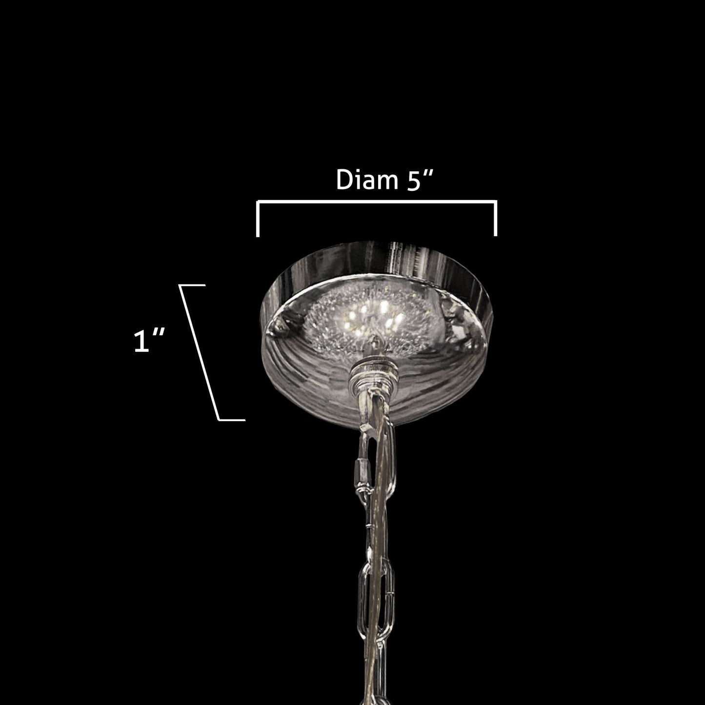 Polished chrome ceiling canopy detail of starburst crystal chandelier