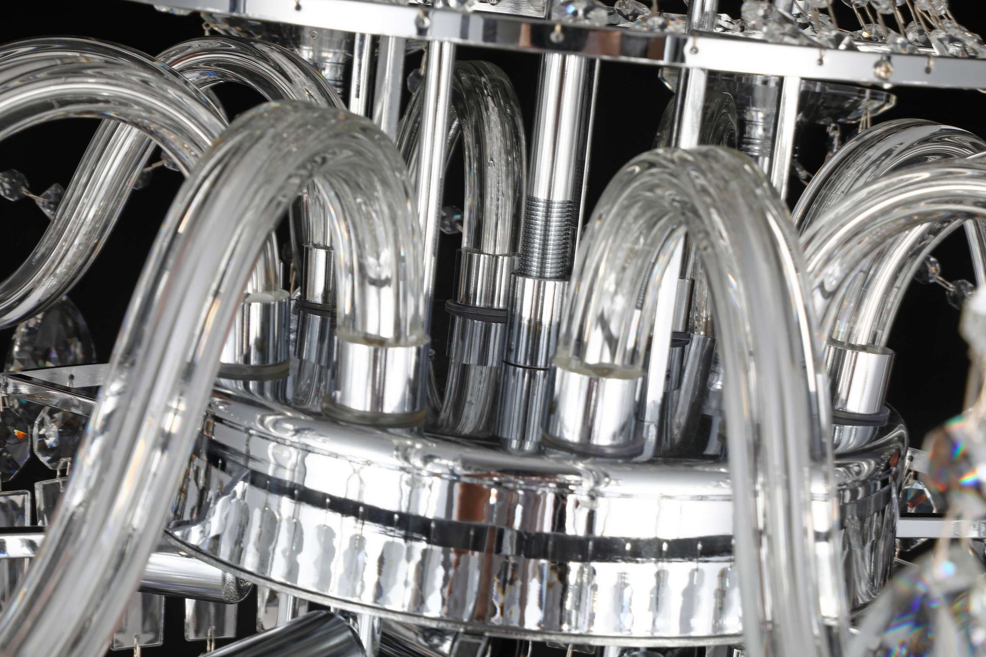 Detailed chrome chandelier arm with sparkling precision-cut crystals and reflective clarity