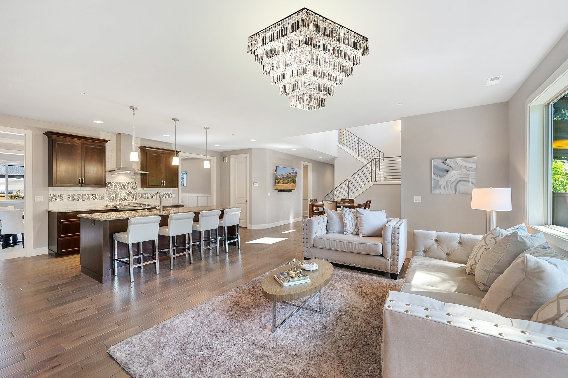  Modern dining room featuring luxury chrome crystal chandelier