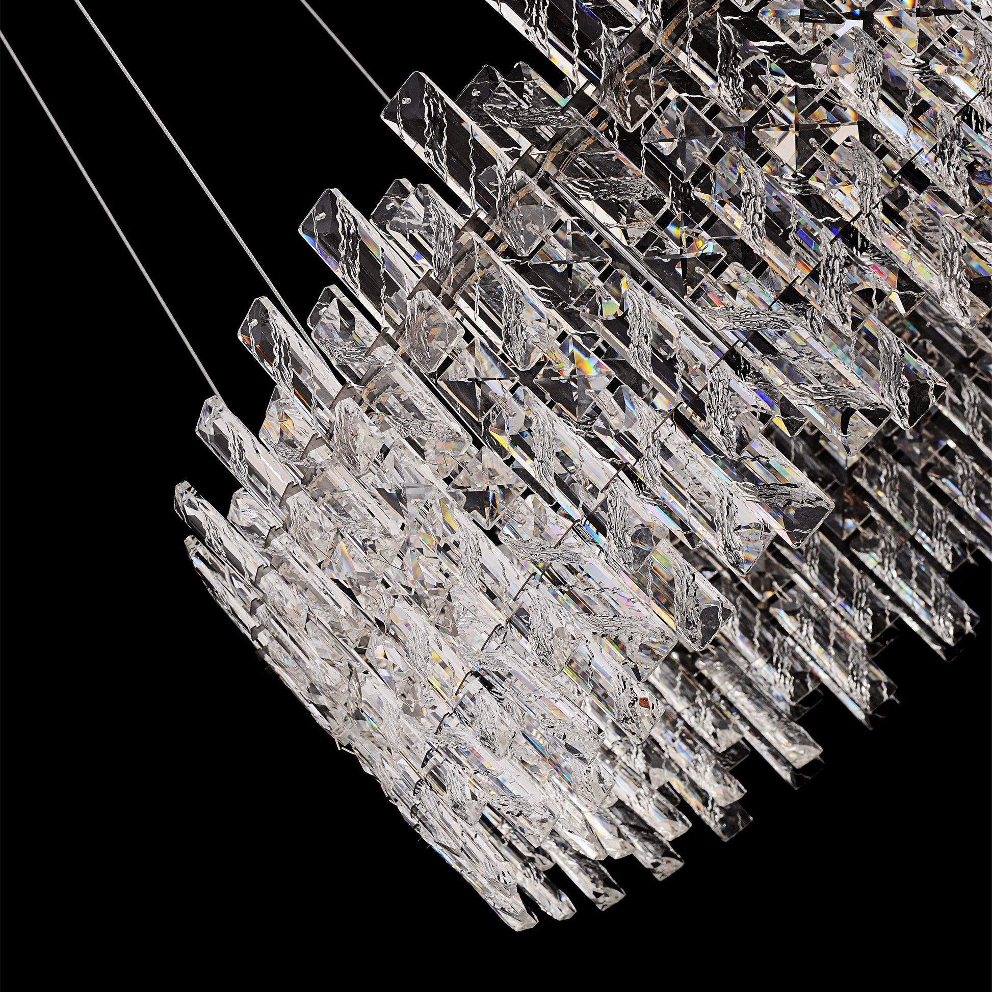 Chrome crystal chandelier detail highlighting reflective sparkle
