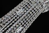 35 inch Close-up of precision-cut crystal strands and chrome accents in a luxury chandelier.