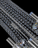 Close-up view of precision-cut crystal chains and polished chrome rods.
