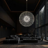  Chrome starburst chandelier illuminating modern living room interior