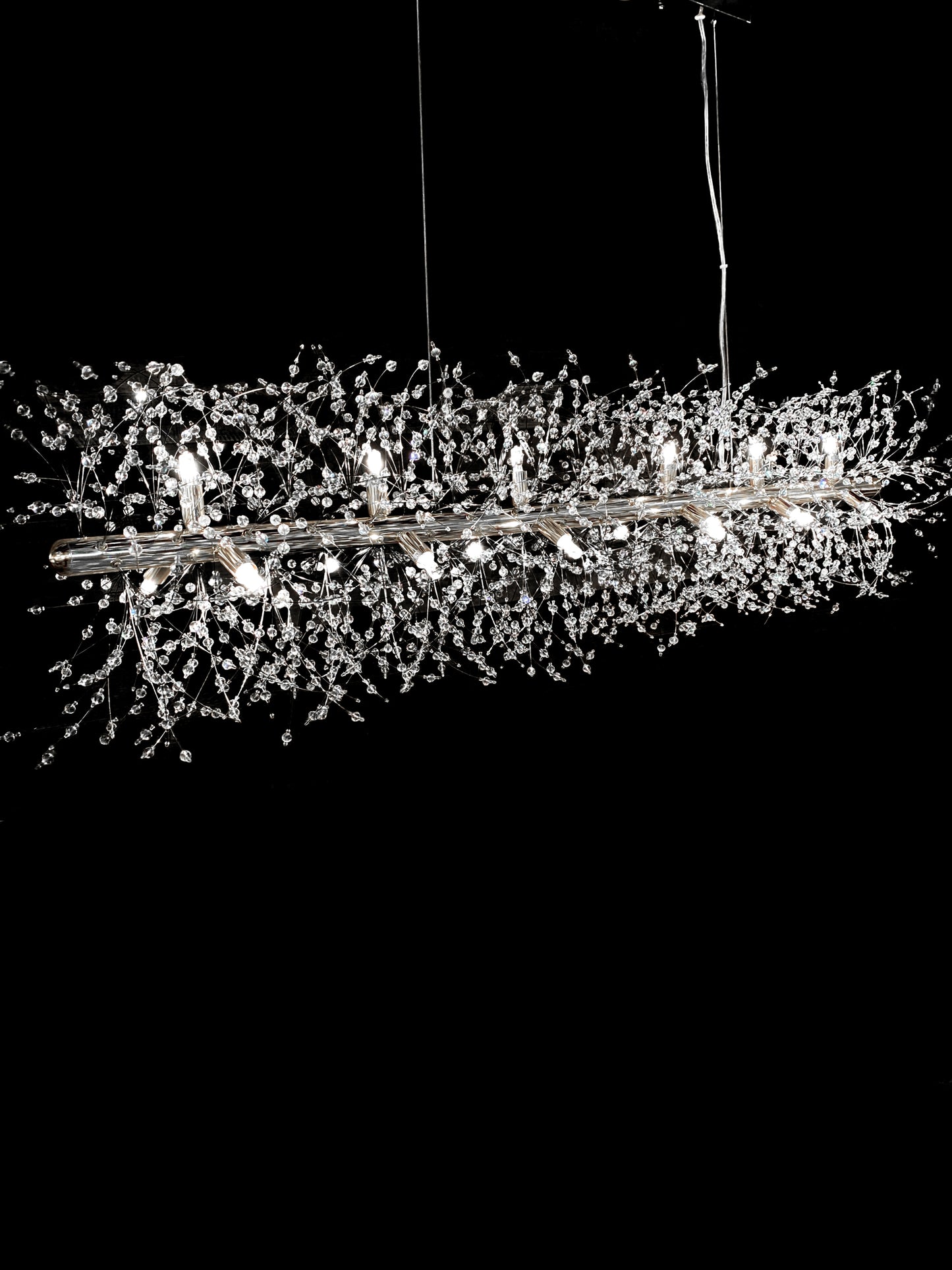 Close-up of starburst crystal branches with chrome finish