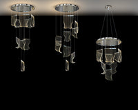 Chrome LED chandelier shown in multiple adjustable configurations with wave panels