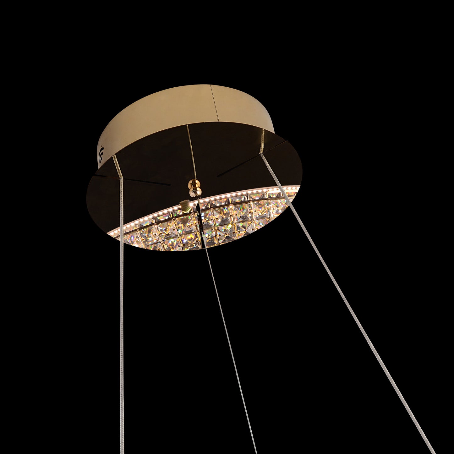 Close-up detail of curved crystal ring showing intricate faceted crystal design.