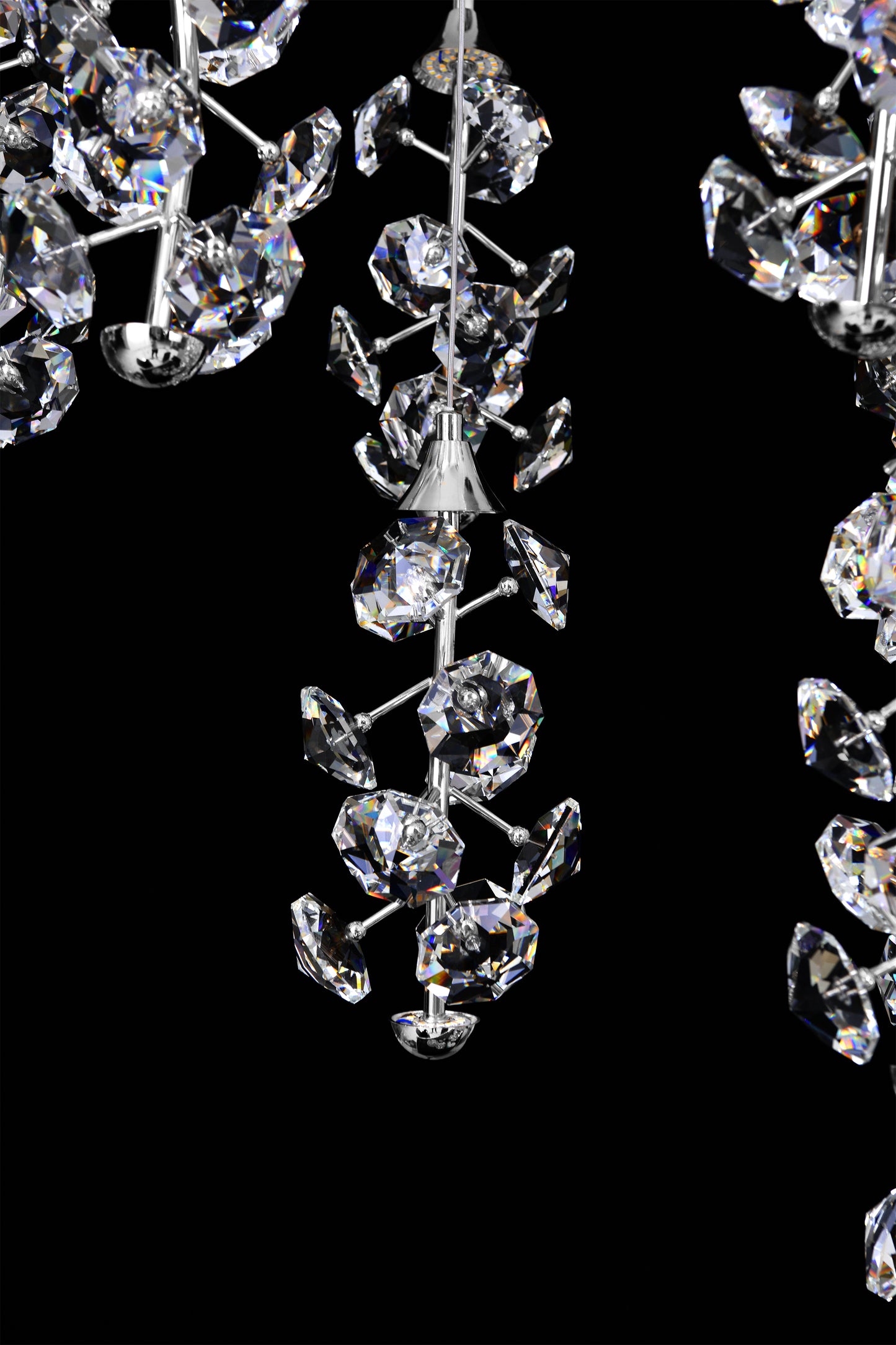 Close-up of crystal clusters on modern LED cascading chandelier
