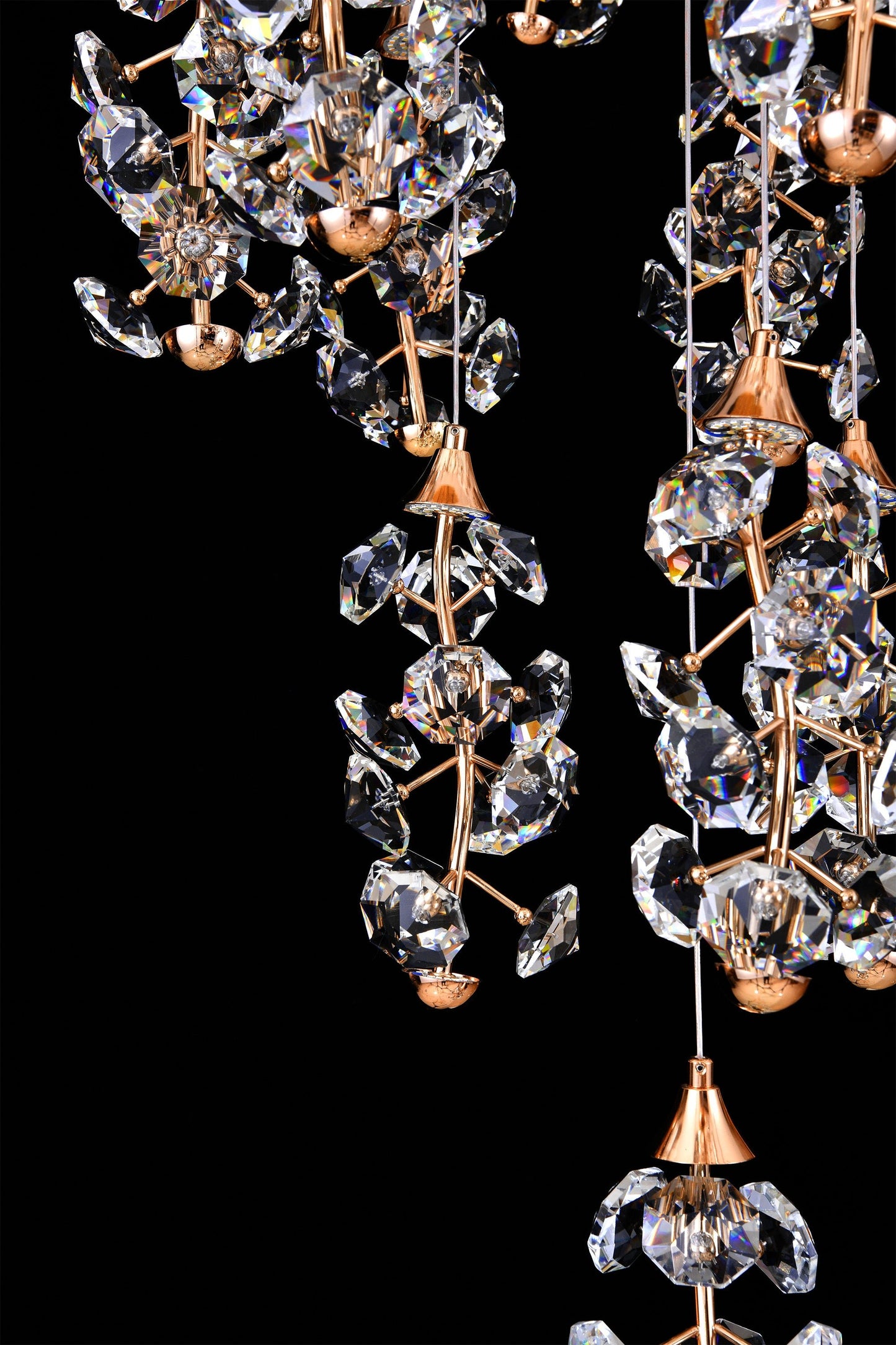 Close-up of crystal clusters on modern LED cascading chandelier