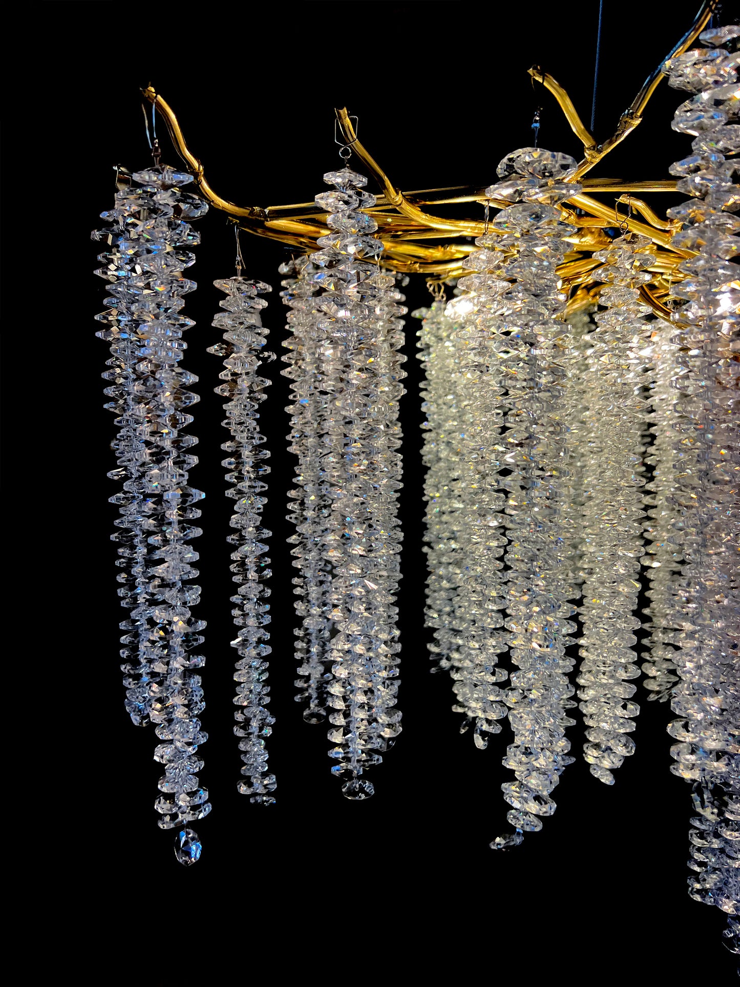 Handcrafted crystal strands with gold metal frame