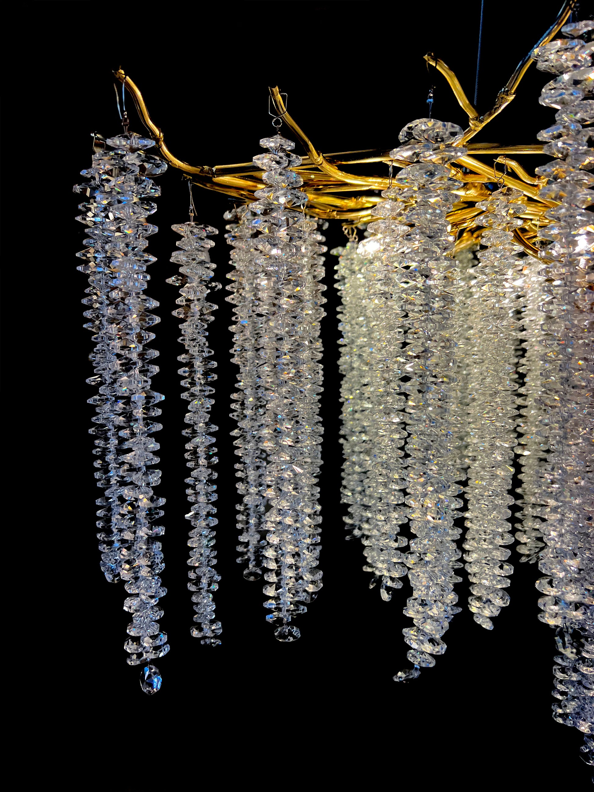 Handcrafted crystal strands with gold metal frame
