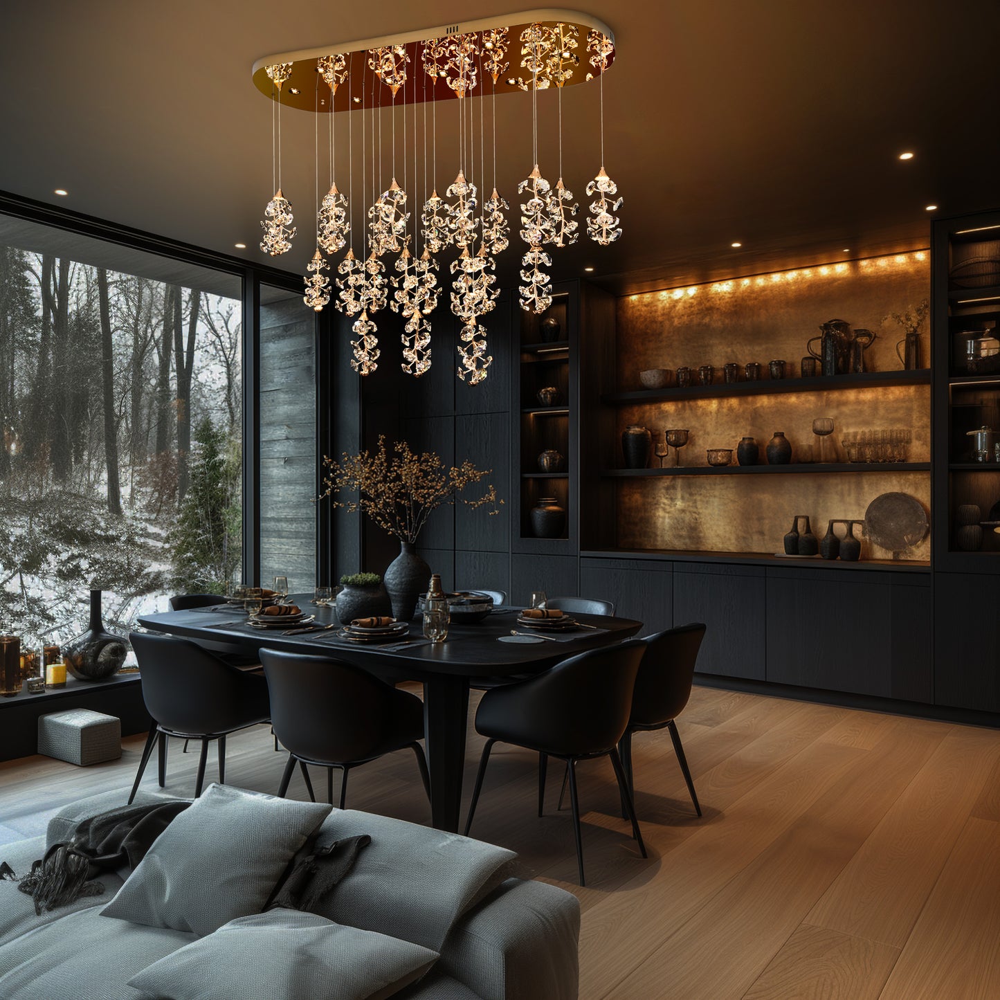 Elegant linear gold dimmable crystal chandelier lighting a luxury lounge interior
