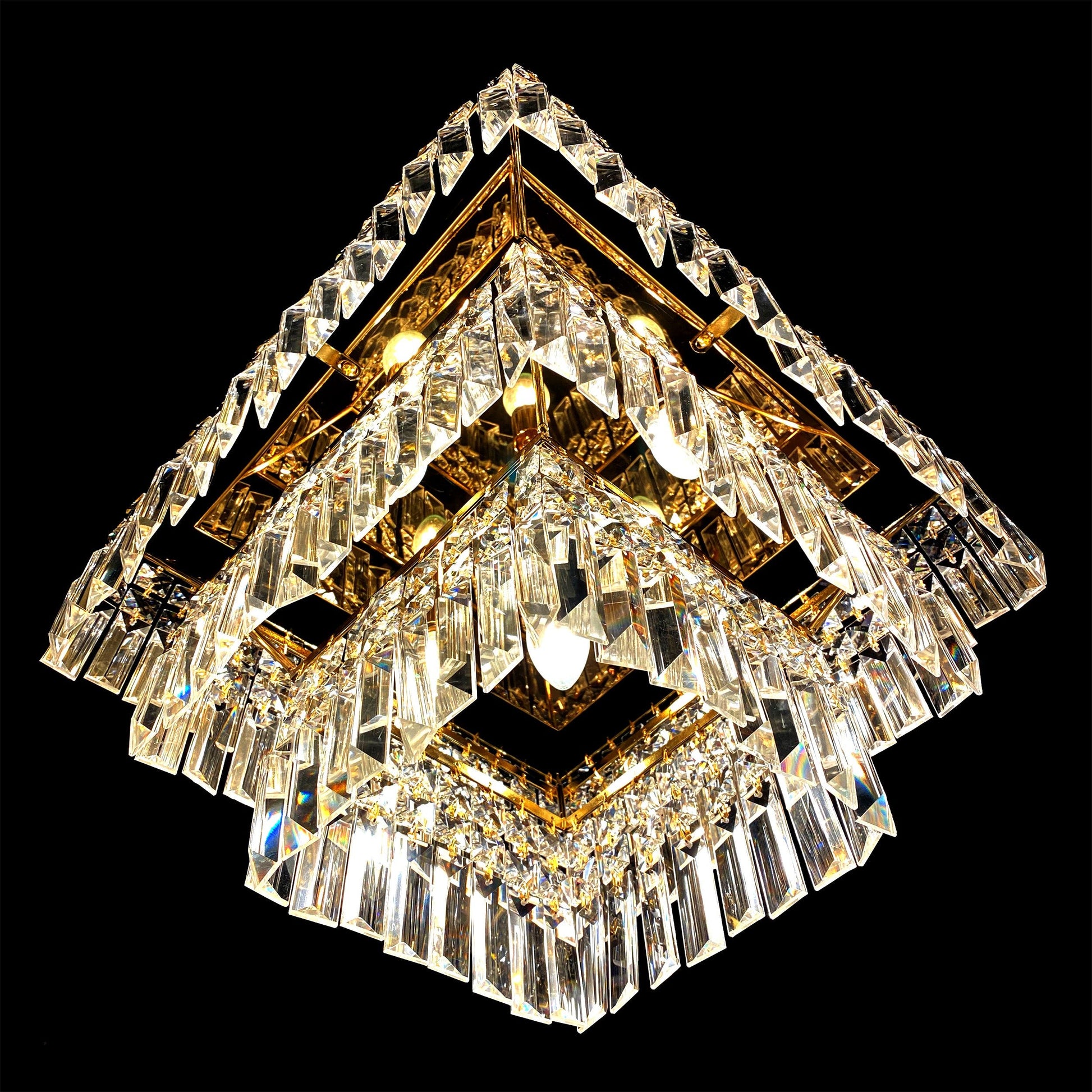 Bottom angle view of gold 3 tier crystal chandelier prisms

