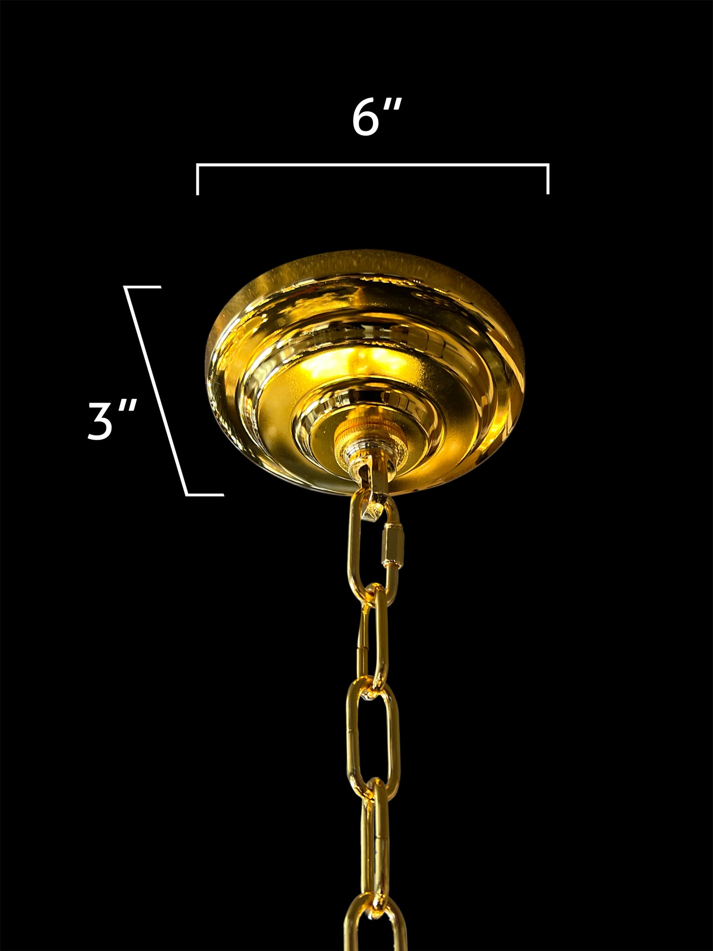 Close-up of the gold canopy and chain detail on a Maria Theresa chandelier.