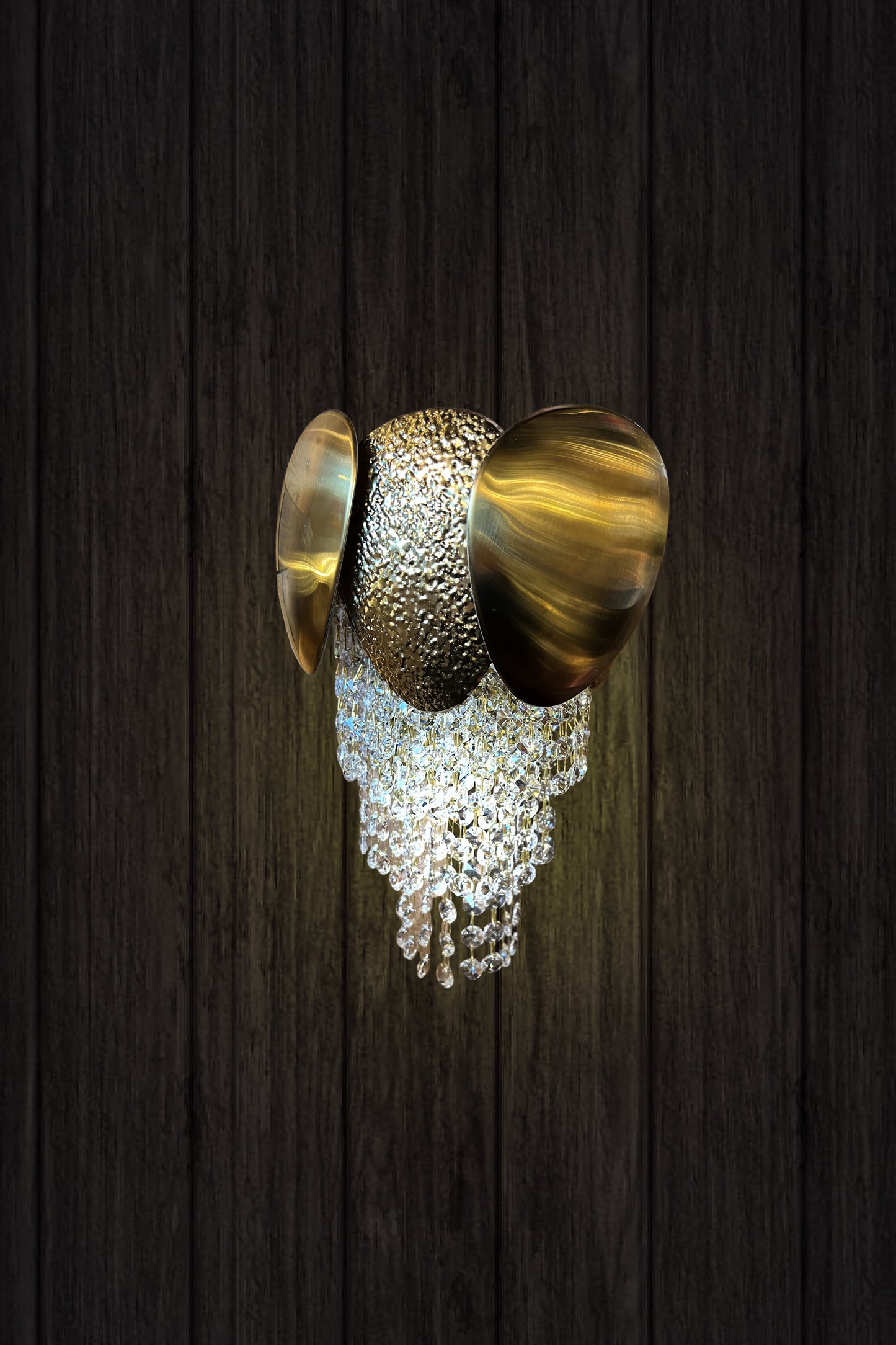 gold crystal LED wall sconce with cascading crystals