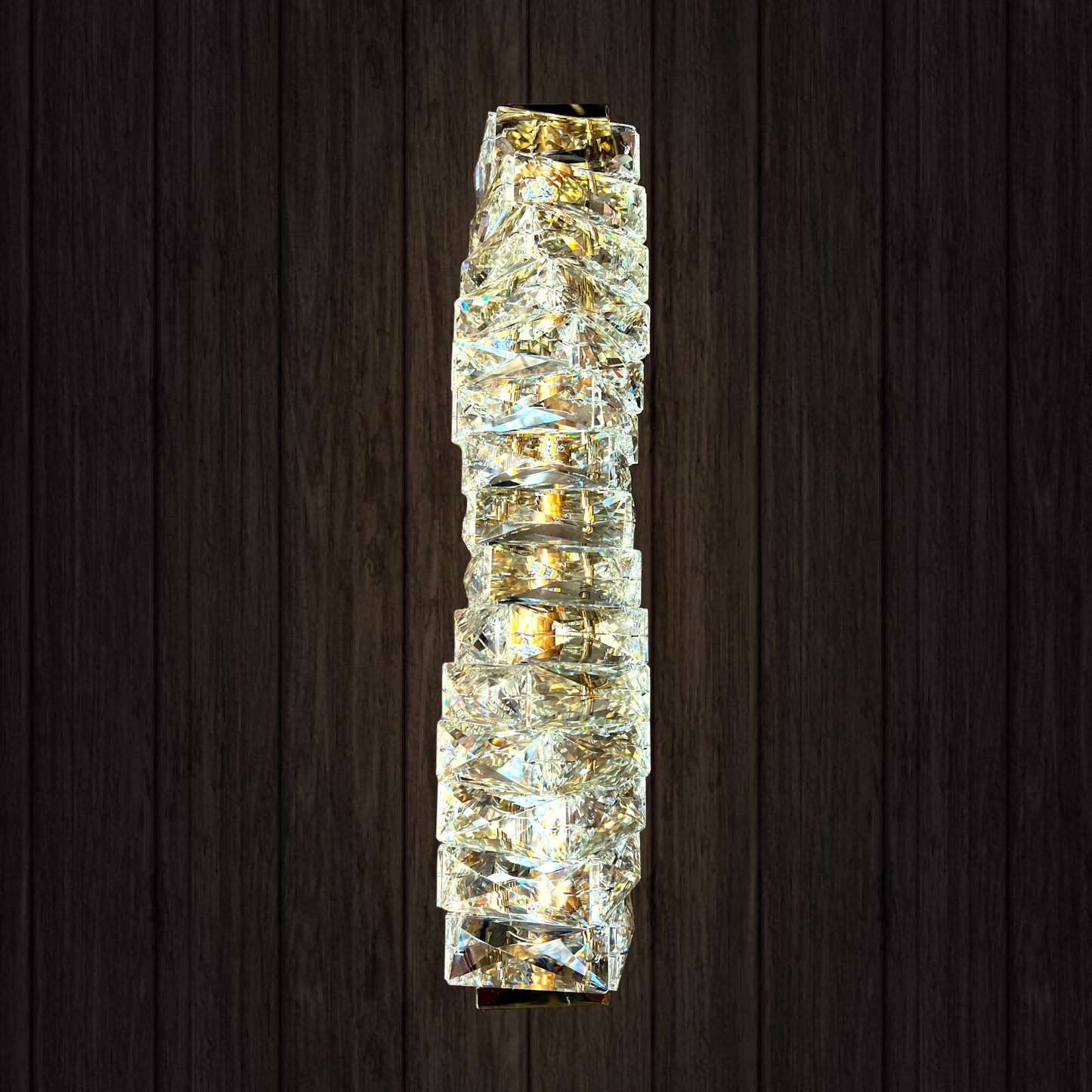 Crystal wall sconce on a dark wooden background