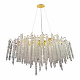 Side view showing cascading crystals and gold finish