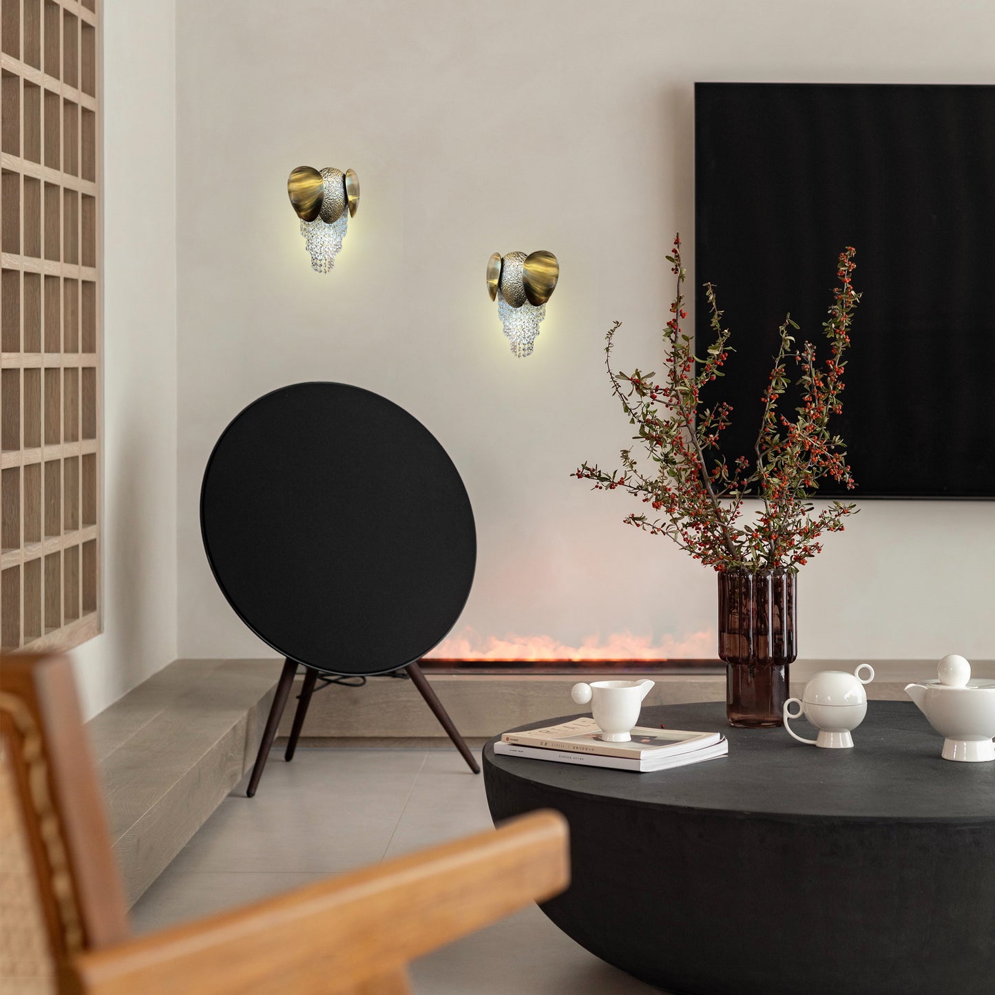 gold crystal wall light in modern sitting area