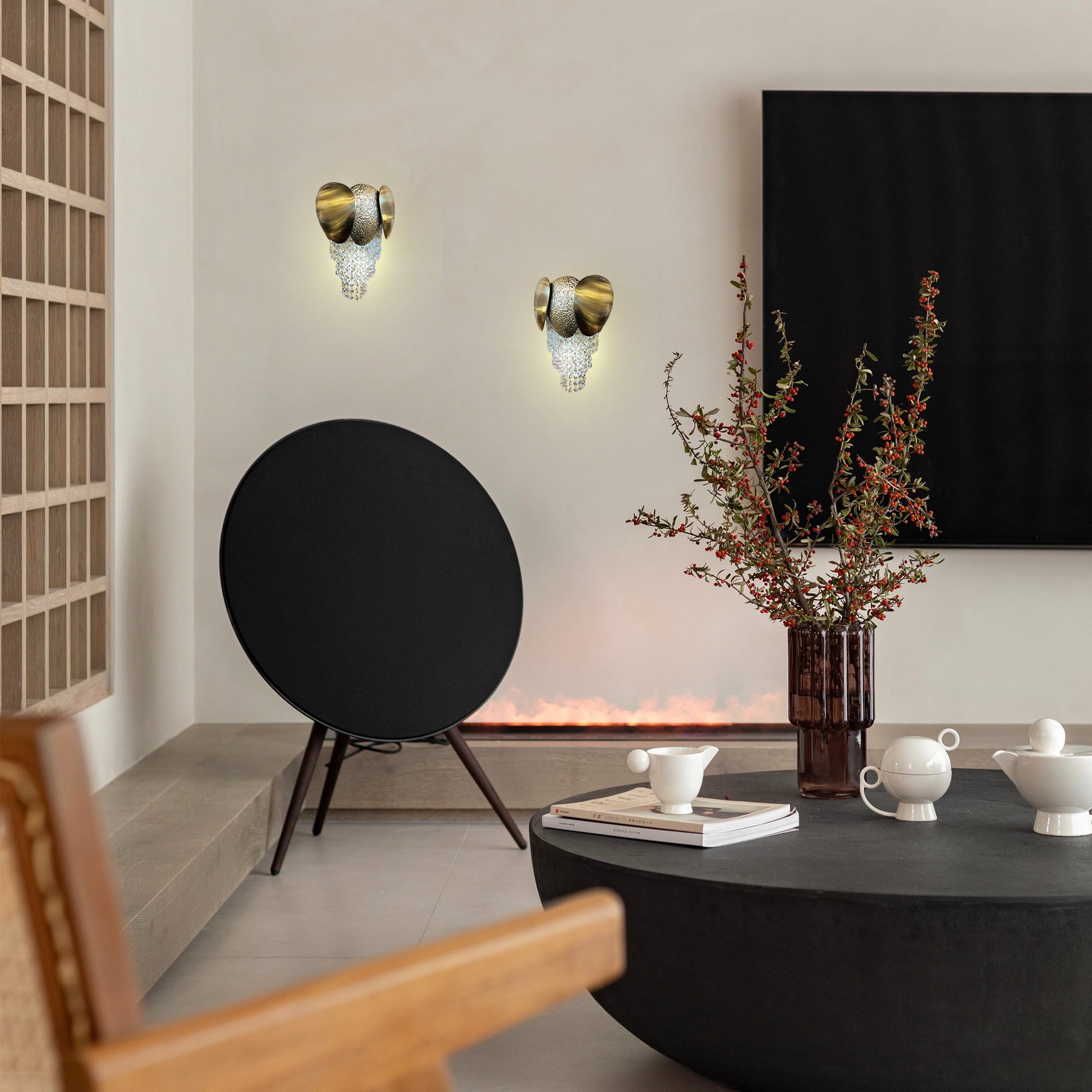 gold crystal wall light in modern sitting area