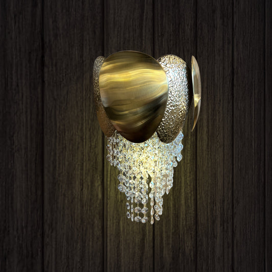 gold crystal wall sconce with cascading crystal.