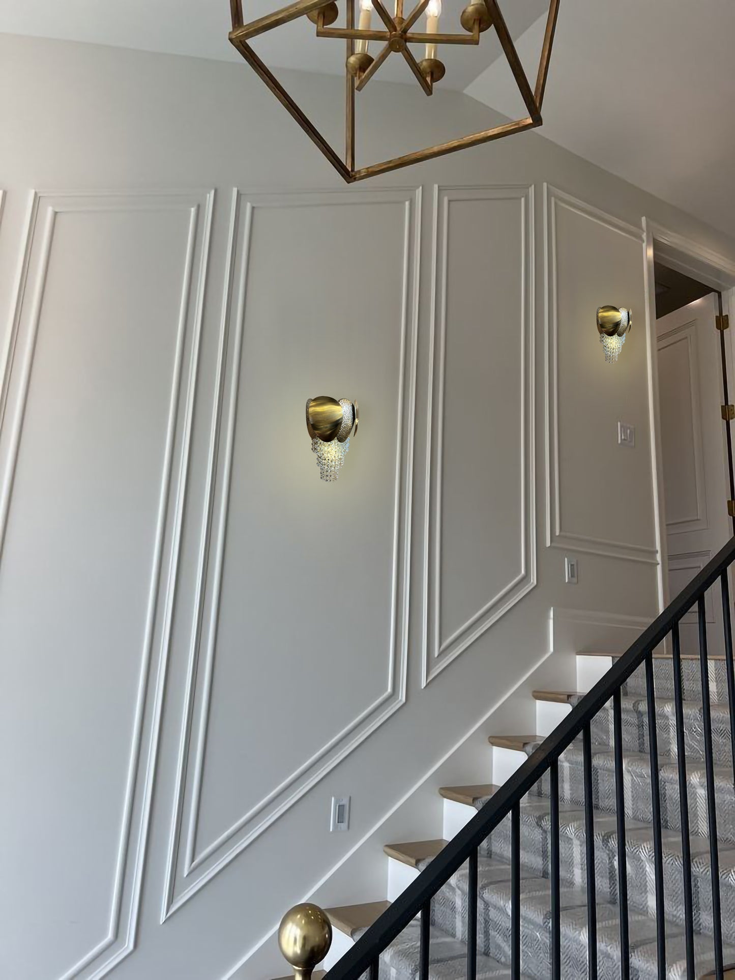 gold led wall lights on luxury staircase wall
