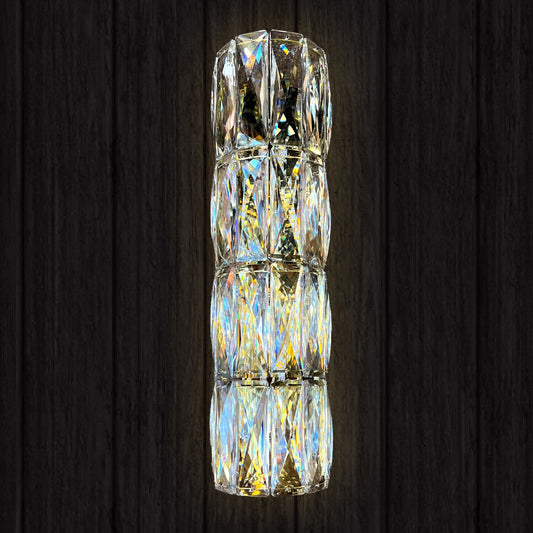 Gold slim crystal LED wall sconce on dark wall