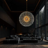 Elegant gold crystal chandelier lighting large modern living room interior