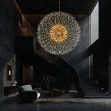 Large gold starburst chandelier displayed in modern open space