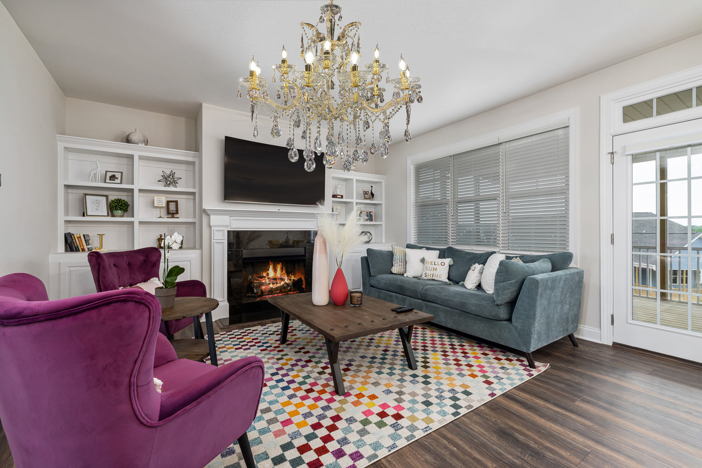 35" Gold crystal Maria Theresa chandelier in a traditional home interior.
