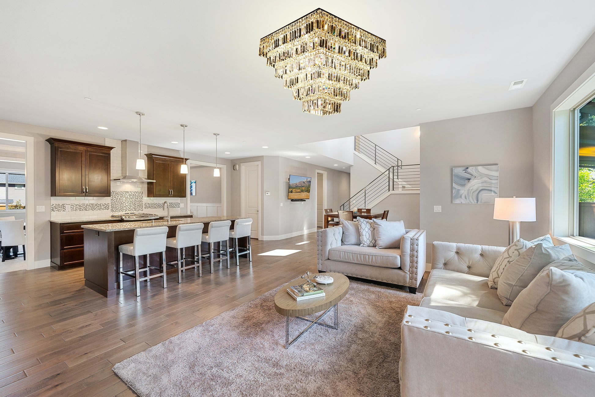 Modern dining room featuring luxury gold crystal chandelier

