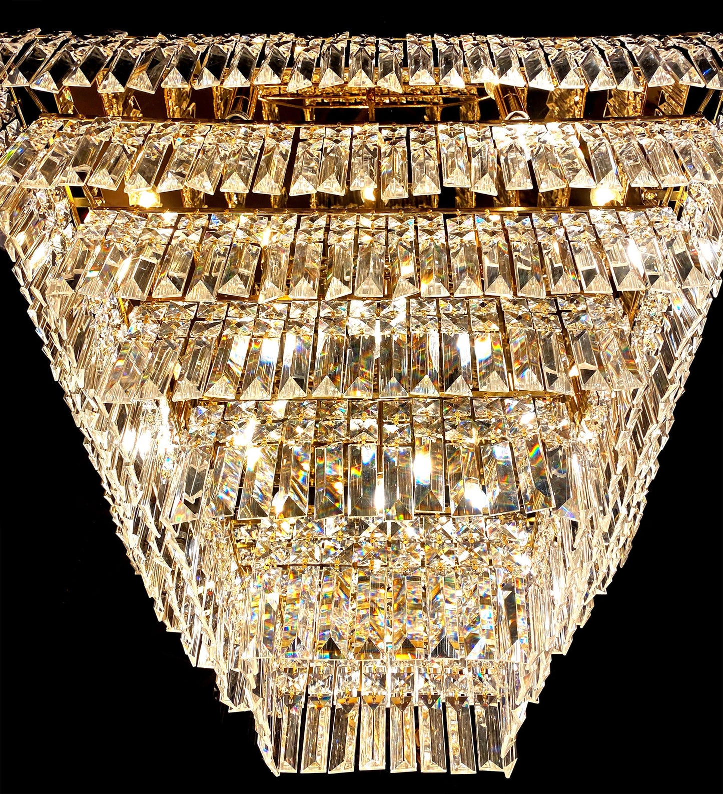 Clear lead crystal prism detail on gold tiered chandelier