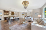  Elegant gold chandelier installed in flush mount living room with white walls