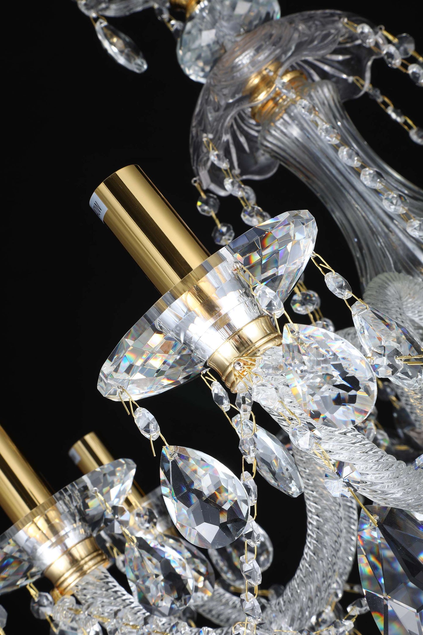 Handcrafted crystal arm with gold detailing and teardrop crystals