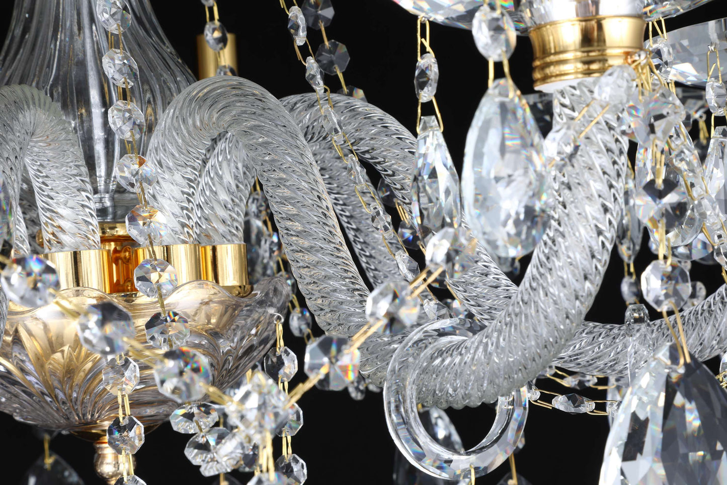 Handcrafted crystal arm with gold detailing and teardrop crystals