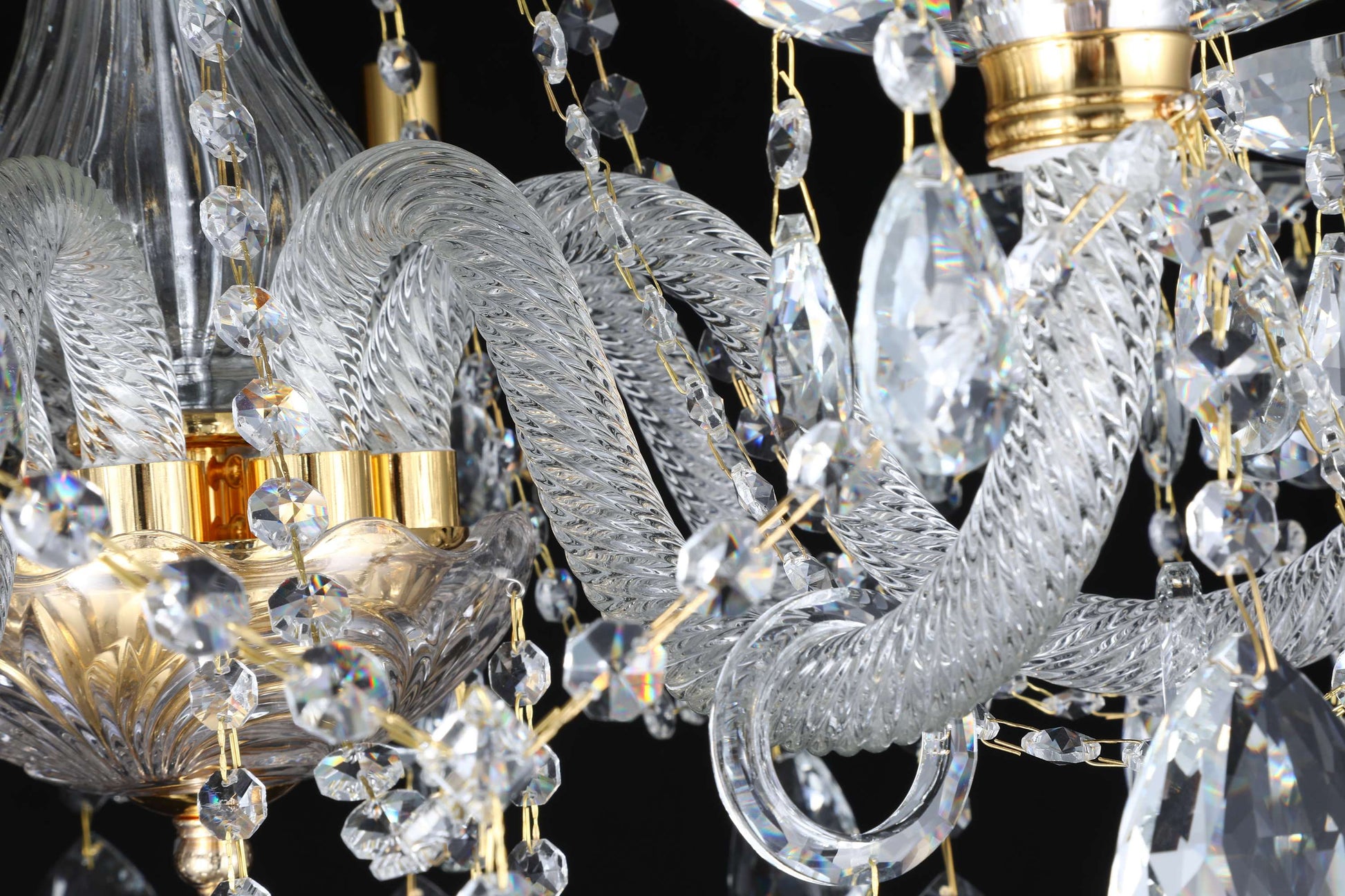 Handcrafted crystal arm with gold detailing and teardrop crystals