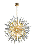 Side view of luxury gold pendant chandelier showcasing warm lighting.