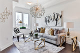Elegant crystal chandelier creating a radiant glow in a family space.