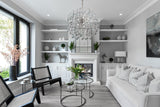 Luxury round crystal chandelier adding elegance to a contemporary space.