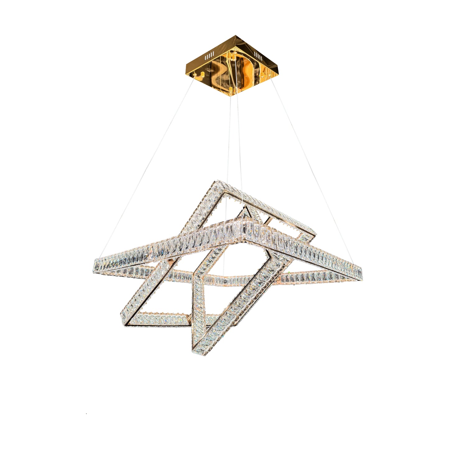  Studio shot of the modern 3-tier gold crystal chandelier isolated on a white background.